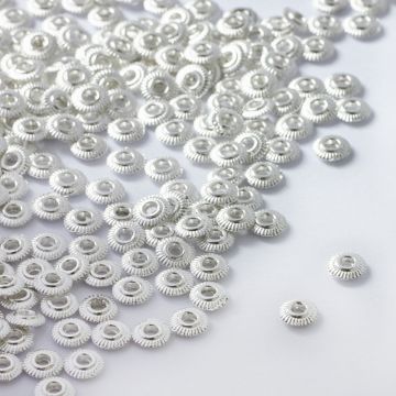 Koraliki metalowe płaskie dyski 5mm