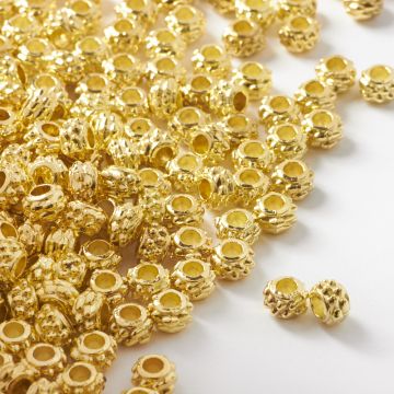 Koralik metalowy oponka z kolcami 6,5mm