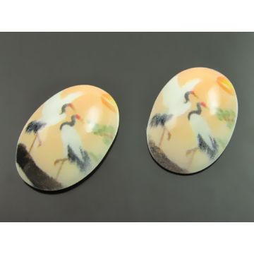 Kaboszon szklany owalny brzoskwiniowy krajobraz 13x18mm