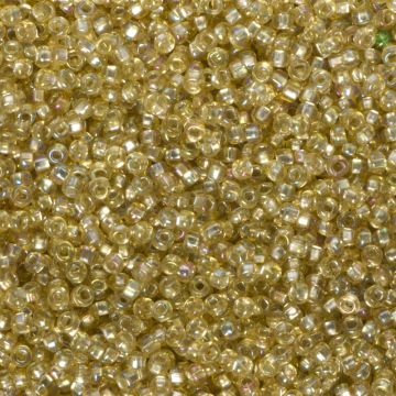 Koraliki NihBeads 12/0 Silver-Lined SH Trans-Raibnow Lt Topaz