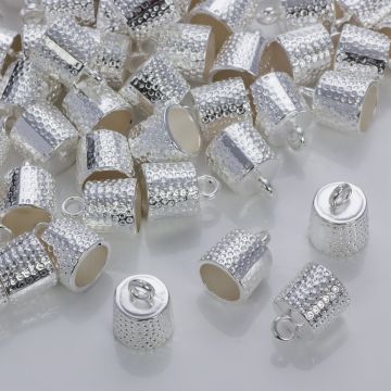 Okrągłe końcówki w kolorze srebrnym z kropeczkami 9mm