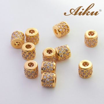 Koralik walec z cyrkoniami złocony 7mm