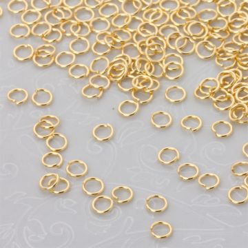 Kółeczka zaciskowe ze stali chirurgicznej w kolorze złotym 4x0,6mm PVD