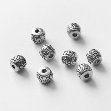 Koralik ze stali chirurgicznej oponka rzeźbiona w kolorze srebrnym 5,5x7mm