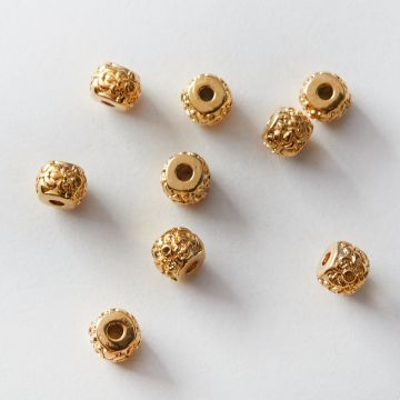 Koralik ze stali chirurgicznej oponka rzeźbiona w kolorze złotym 5,5x7mm