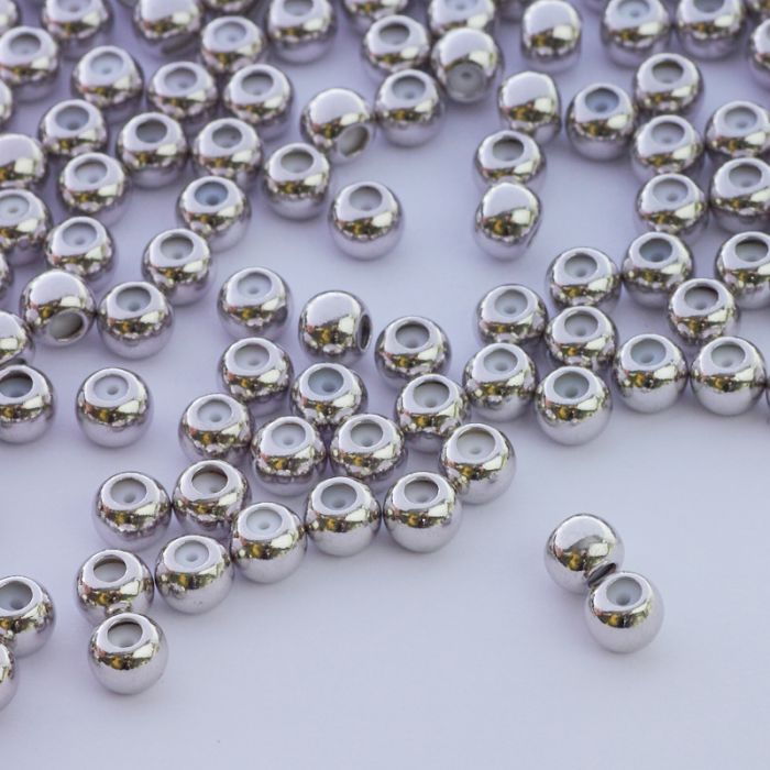 Zapięcie stoper z silikonem do cienkich sznureczków kulki srebrne 5mm Zapięcie stoper z silikonem do cienkich sznureczków kulki srebrne 5mm