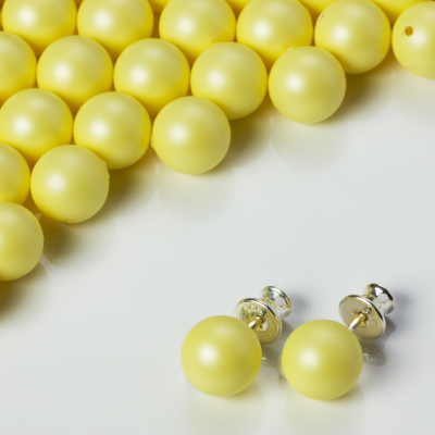 Perły SWAROVSKI do kolczyków (945) Pastel Yellow 8mm