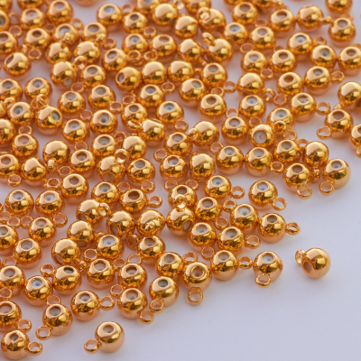 Zapięcie stoper z silikonem do cienkich sznureczków złote kulki z krawatką 6x4mm