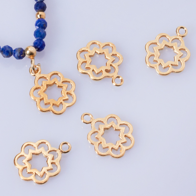 Srebrna zawieszka gwiazdka w kwiatku AG925 pozłacana 10mm