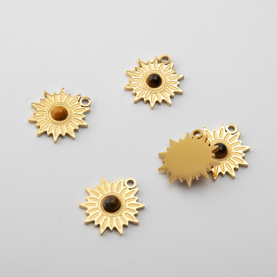 Zawieszka ze stali chirurgicznej słoneczko z tygrysim okiem w kolorze złotym 17mm PVD