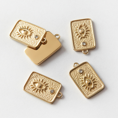 Zawieszka ze stali chirurgicznej prostokąt z okiem proroka i cyrkonią w kolorze złotym 14x12mm PVD