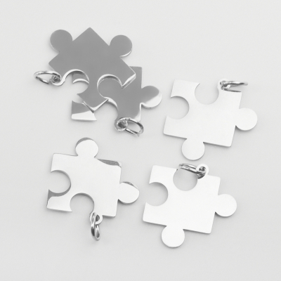 Zawieszka ze stali szlachetnej puzzel w kolorze srebrnym 17,5mm
