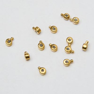 Zacisk w kształcie walca do nici, linek, sznureczków ze stali szlachetnej w kolorze złotym 0,6mm