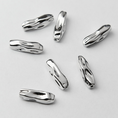 Przekładka oliwka długa gnieciona z mosiądzu 17x5,5mm