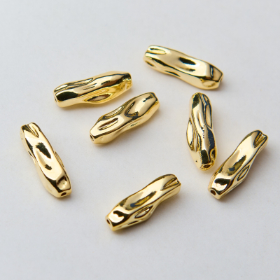Przekładka oliwka długa gnieciona z mosiądzu 17x5,5mm