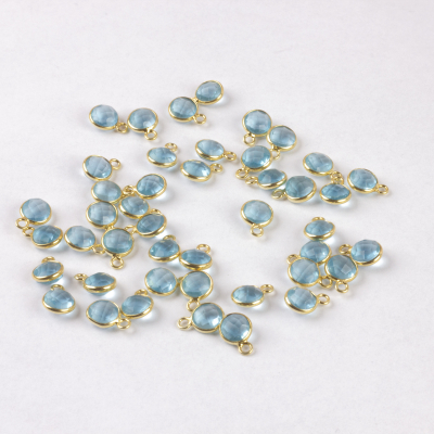 Topaz błękitny krążek fasetowany w okuciu zawieszka AG925 6mm